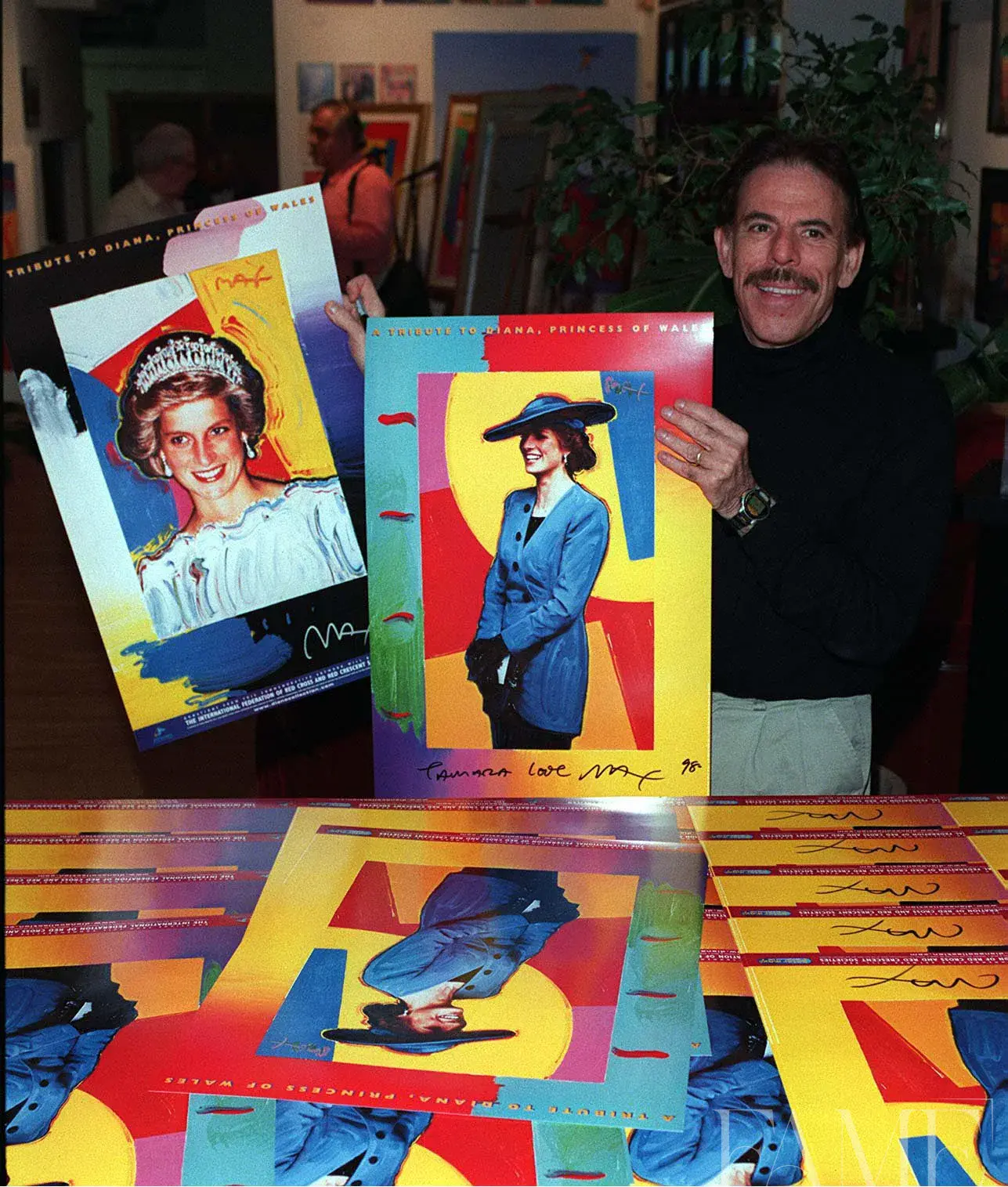 Peter Max painting a portrait of Princess Diana in New York, 2 of 4