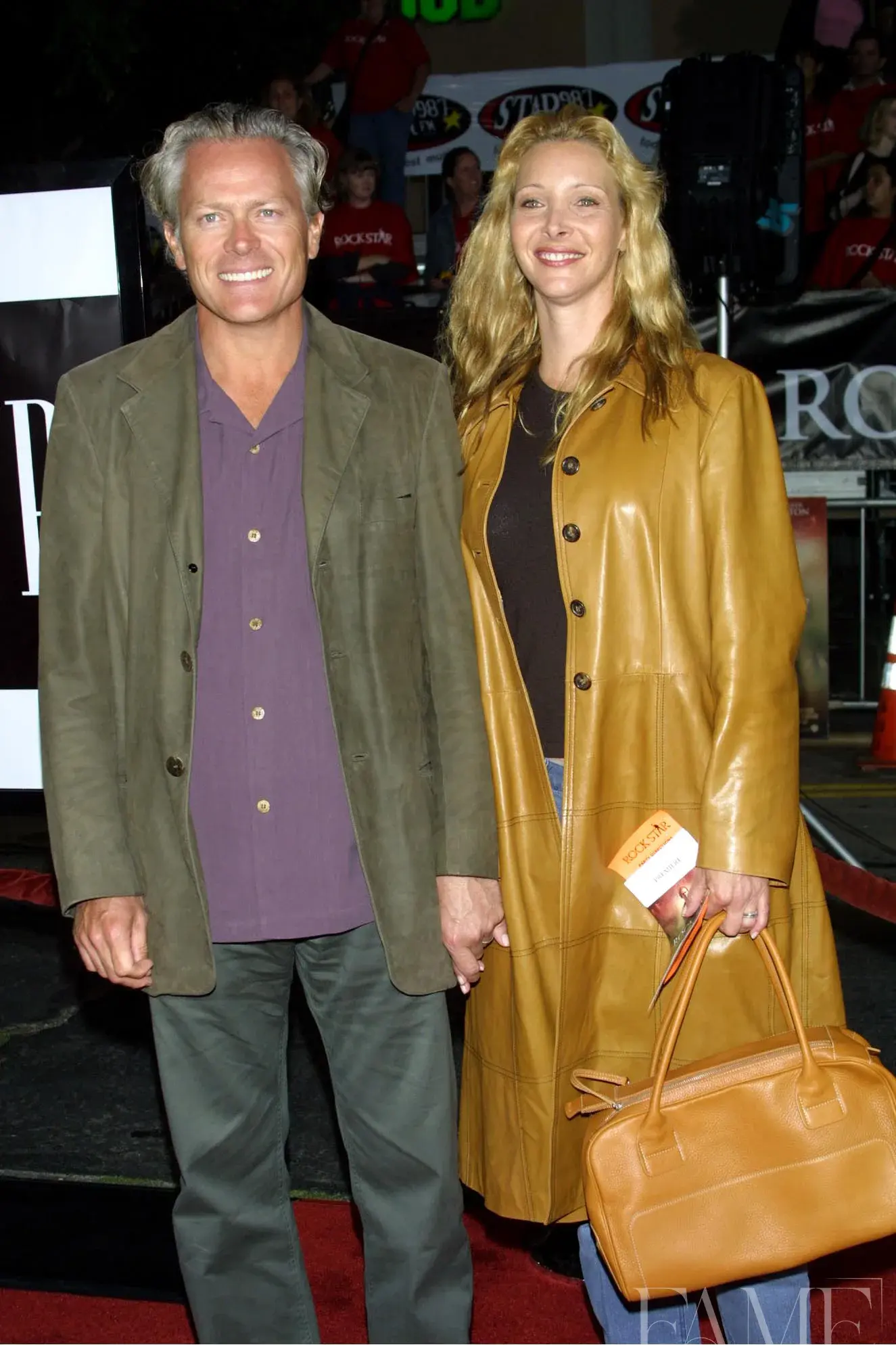 Lisa Kudrow and Michel Stern on the red carpet at the Rock Star premiere in 2001