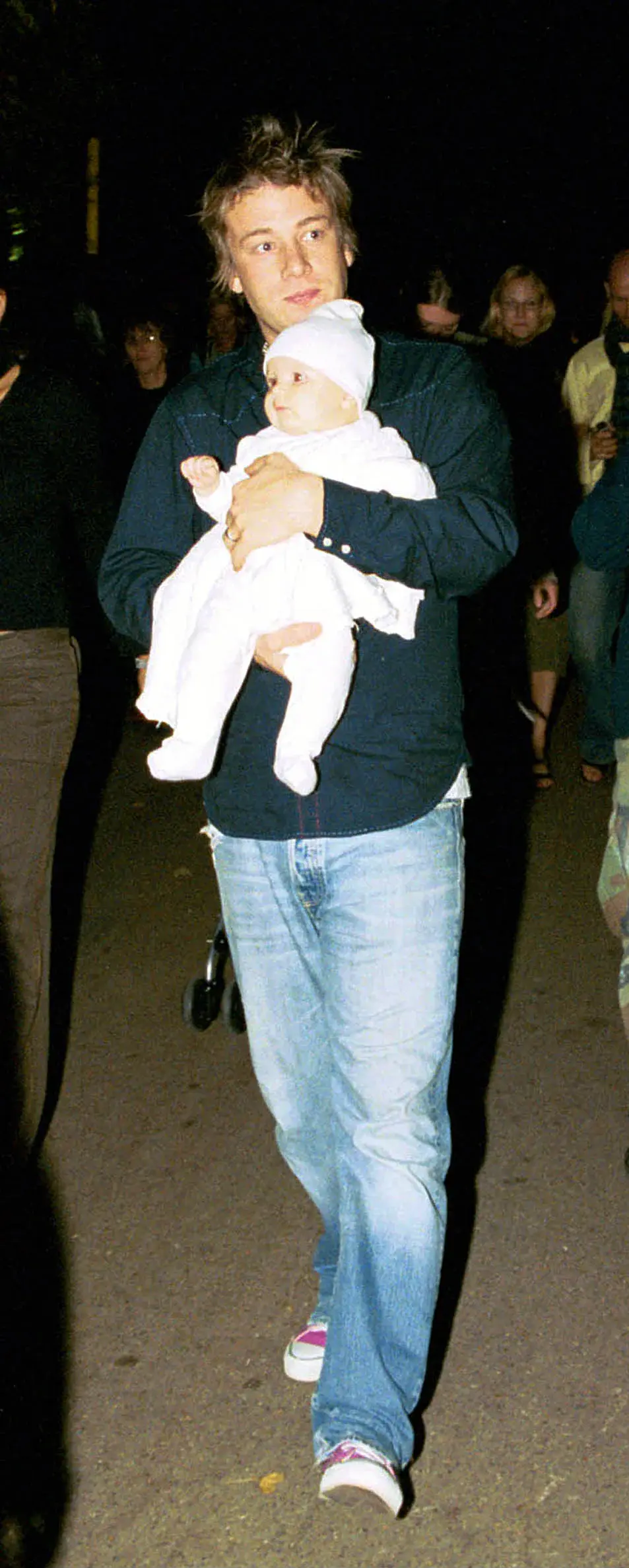 Jamie Oliver with Poppy Oliver at the FROSTFRENCH fashion show in London in 2002