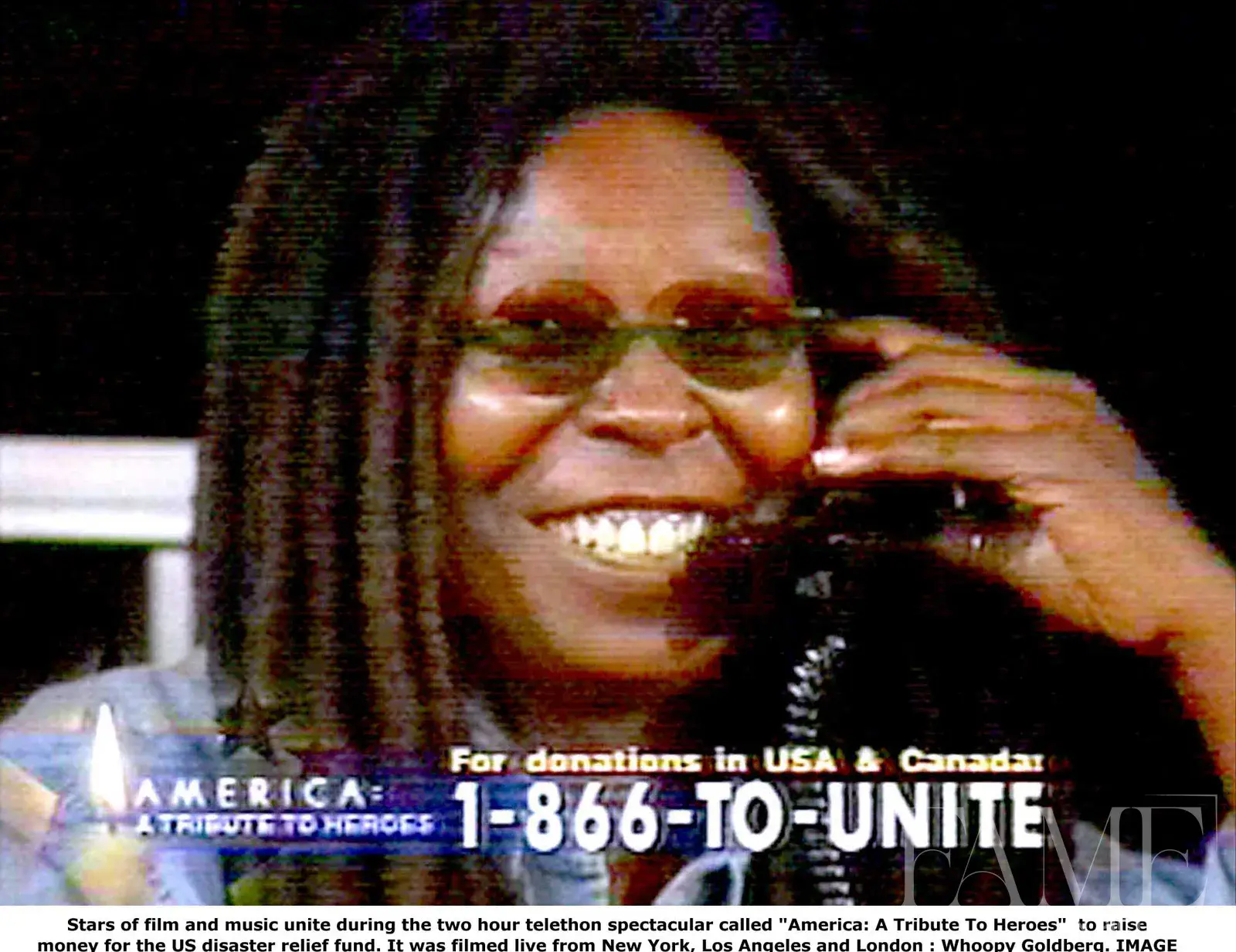 Whoopi Goldberg taking calls during the America: A Tribute to Heroes telethon in 2001