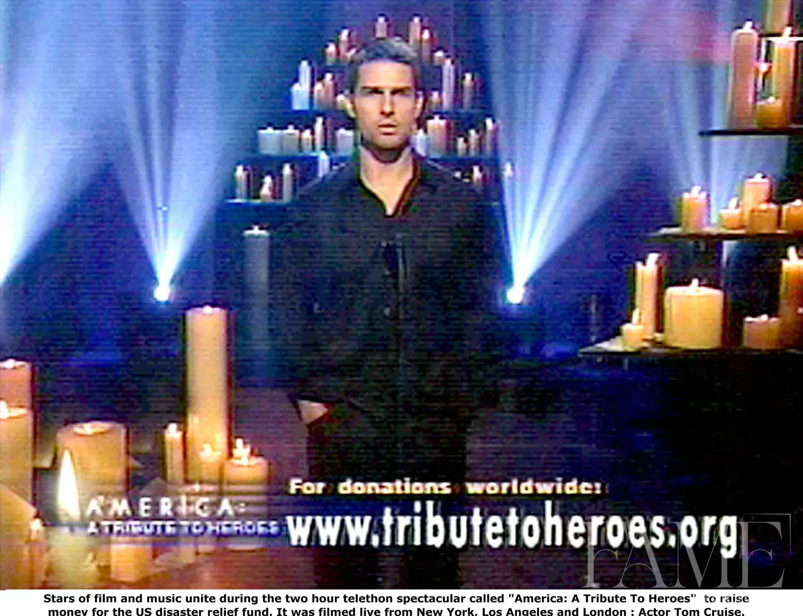 Tom Cruise speaking on a candlelit set during America: A Tribute to Heroes in 2001