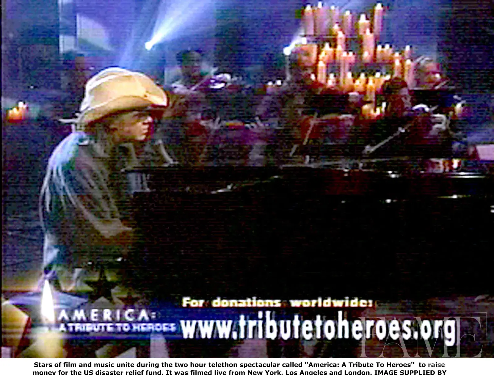 Neil Young performing at the piano during America: A Tribute to Heroes in 2001