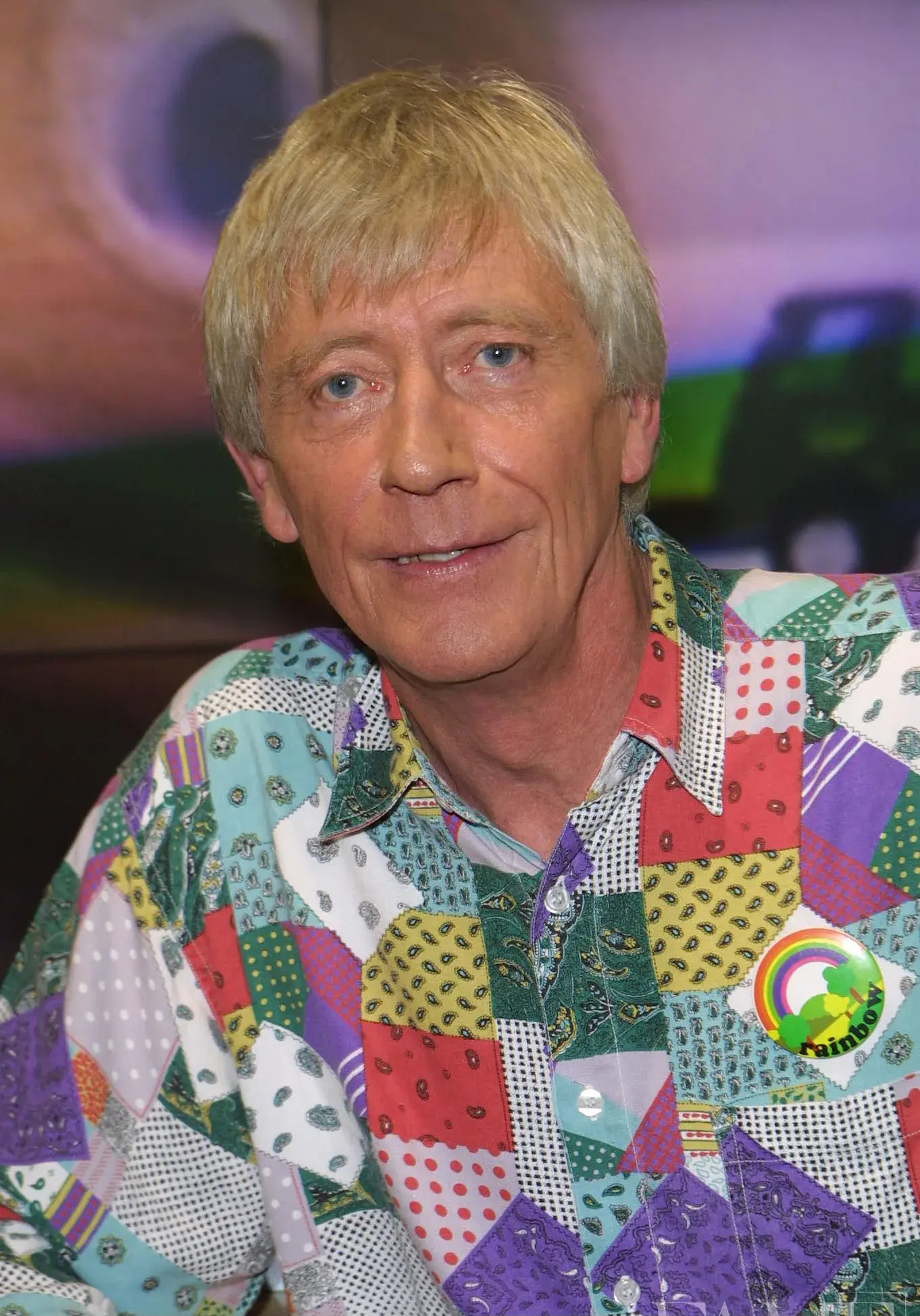 Geoffrey Hayes wearing a brightly patterned shirt at the Rainbow HMV appearance