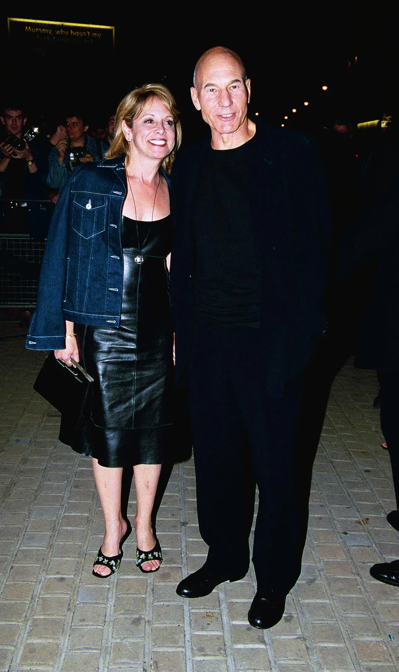 Patrick Stewart standing with a guest outside the X-Men afterparty venue in London