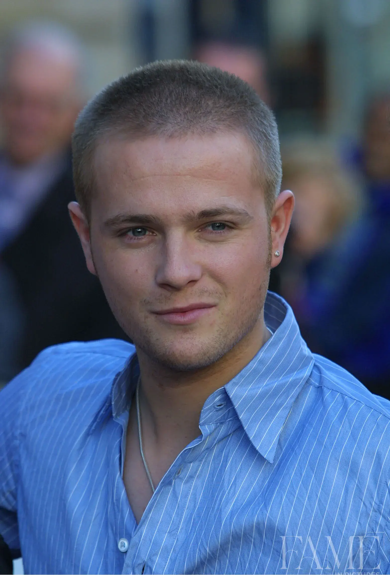 Nicky Byrne in a striped blue shirt at the Westlife album launch